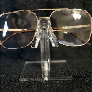 MCM Men's Glasses with Silver Frame and Black Details